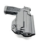 Black Sig Sauer P365-FUSE with light mounted in a black Kydex OWB holster