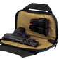 Black handgun in tan-lined zippered case, ideal for first responders and firearm safety