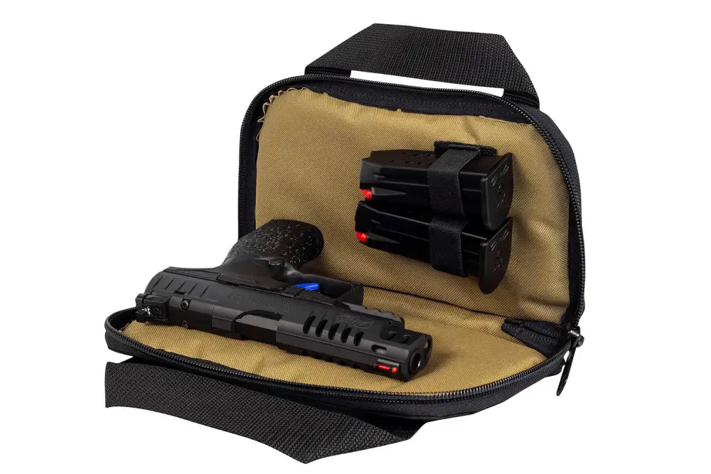 Black handgun in tan-lined zippered case, ideal for first responders and firearm safety