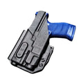 Black holster with blue-gripped handgun for Light Bearing IWB Holsters with optic cut