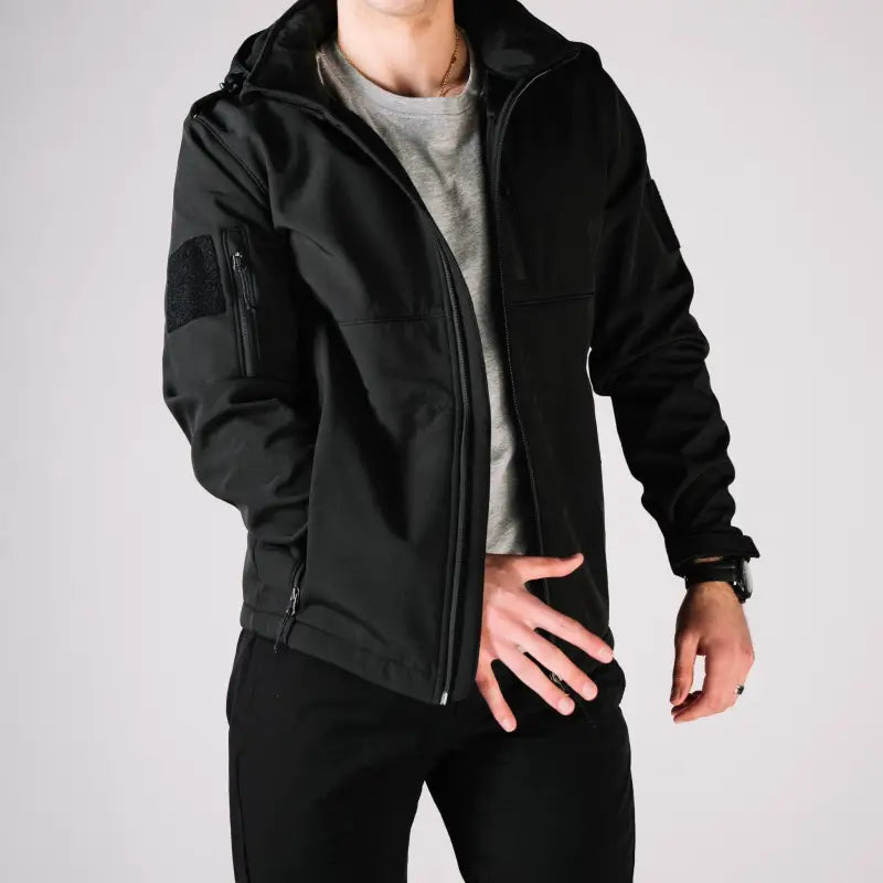 Black hooded tactical jacket with hand pockets for Tactical Jacket Alpha collection