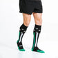 Black knee-high athletic socks with green and white stripes for First Responders