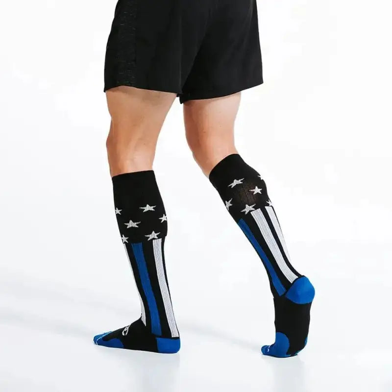 Black knee-high socks with stars and stripes design in Responder Blue for first responders