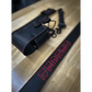 Black leather radio strap with red embroidery for quick access and style