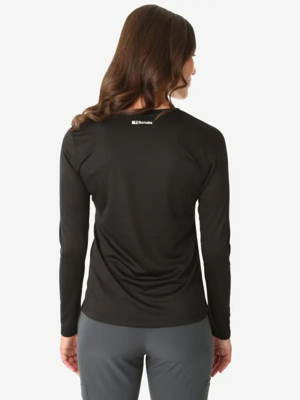 Black long-sleeve underscrub for women, showcased from the back