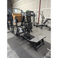 Black weightlifting machine in SFE Plate Loaded V-Squat Rack for strength training