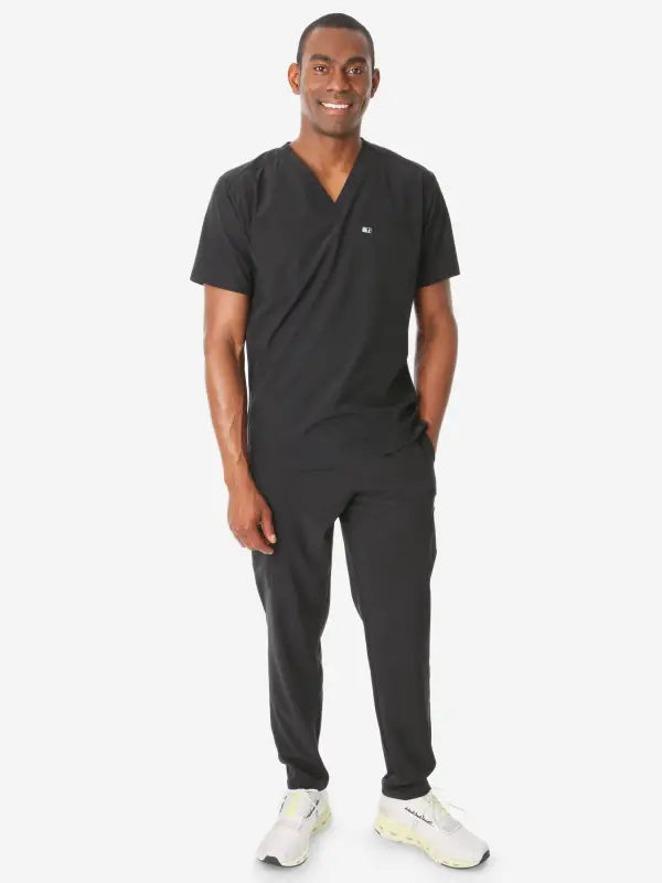 Black men’s double-pocket scrub uniform with short sleeves and jogger-style pants