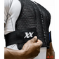 Black mesh Maxx-Dri Vest 4.0 with adjustable fit and XX branding being fastened