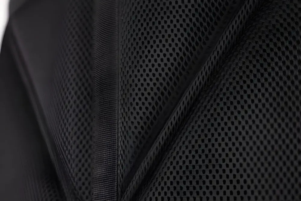 Black mesh fabric with textured pattern for SUMMIT Discreet Rifle Backpack features