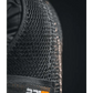 Black mesh fabric of the Maxx-Dri Vest 5.0 with orange and white logo tag