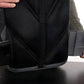 Black mesh office chair with armrests beside SUMMIT Discreet Rifle Backpack and pouch