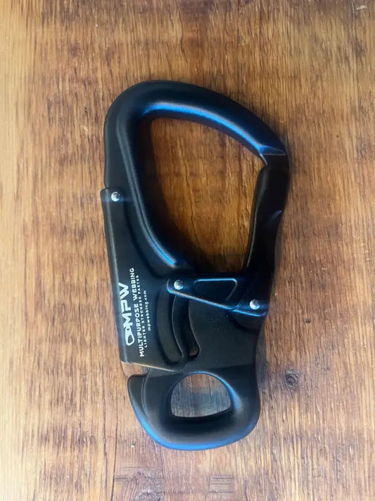 Black metal carabiner with locking mechanism for firefighters and first responders