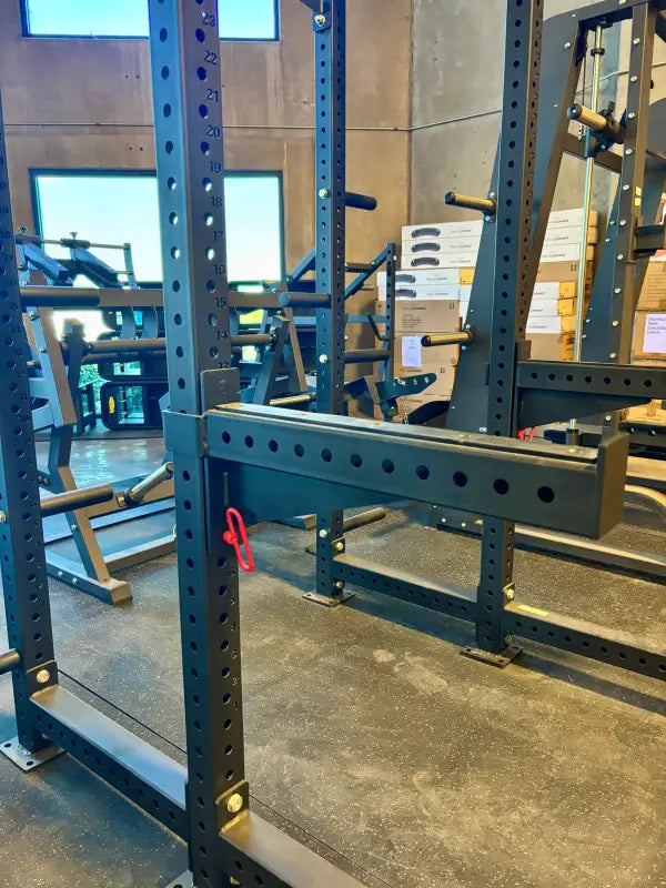 Black metal power rack for strength training and squat rack exercises in SFE Commercial model