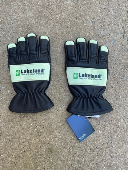 Black and mint green Lakeland leather structural glow dark firefighting gloves