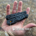 Black multi-tool held in hand, perfect for Gerber Gear first responders and firefighters
