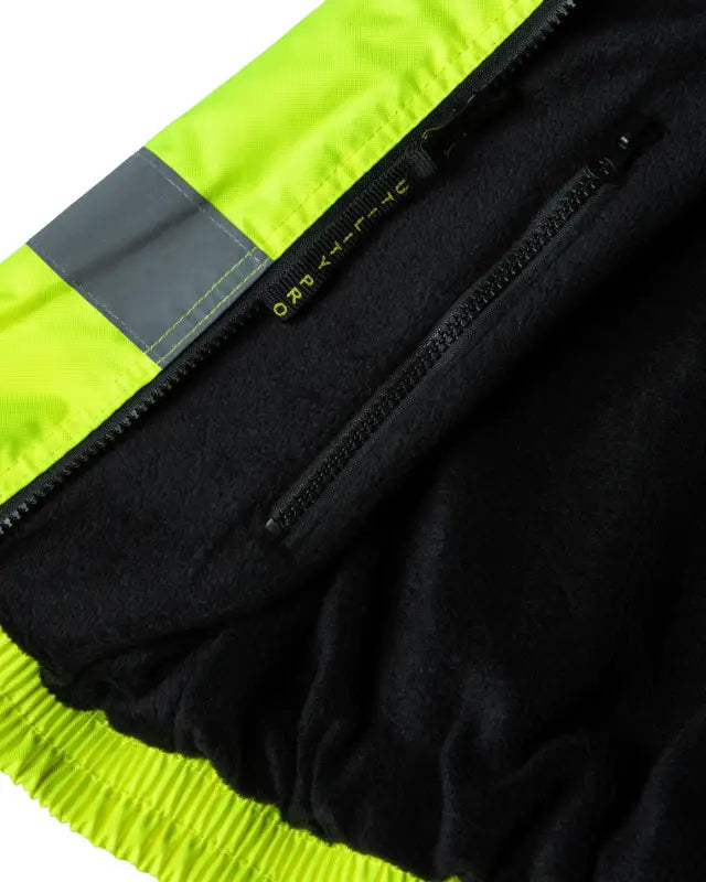 Black and neon yellow UHV1001 HiVis Full Zip Reversible Insulated Vest with zippered pocket