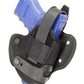 Black nylon and leather belt slide holster featuring a blue Sig Sauer handgun