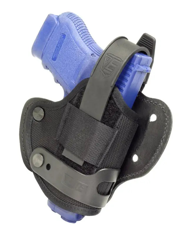 Black nylon and leather belt slide holster featuring a blue Sig Sauer handgun