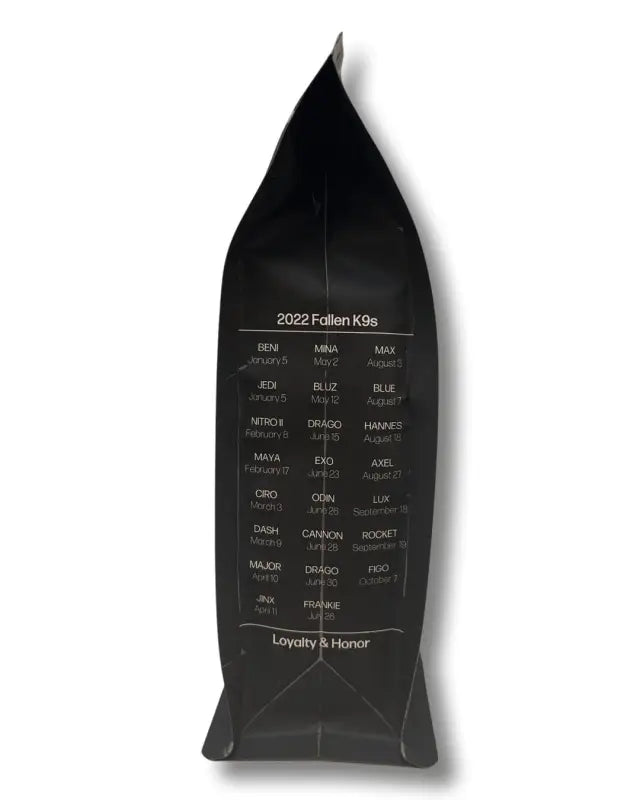 Black obelisk-shaped award with engraved text for K9s United Coffee 12oz