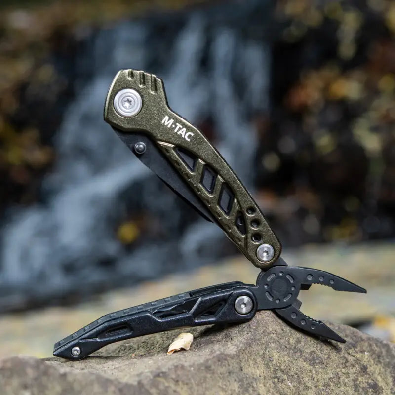 Black and olive M-Tac Universal Tool Type 2 with pliers and folding components