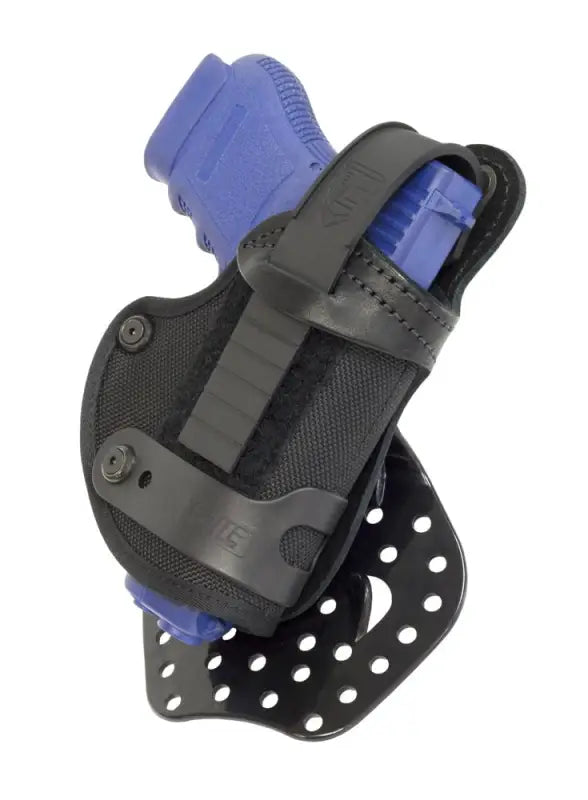 Black Contour Paddle Holster with blue training pistol, compatible with Sig Sauer and H&K