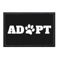 Black Adopt Paw patch with velcro loop surface featuring paw print as O