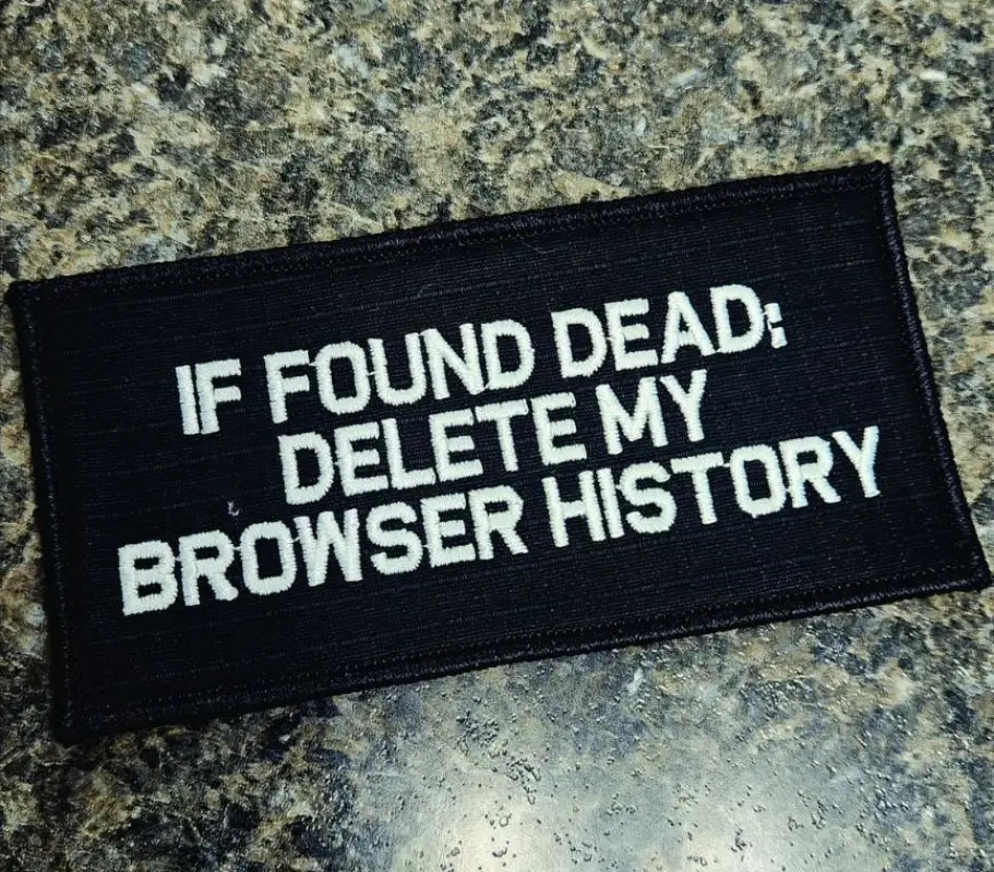 Black with silver 2x4 patch reading IF FOUND DEAD DELETE MY BROWSER HISTORY