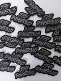 Stay Dangerous PVC patch featuring graffiti-style lettering for gear and vests