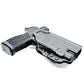 Black pistol with Streamlight TLR-7 HL-X in Sig Sauer holster for OWB carry