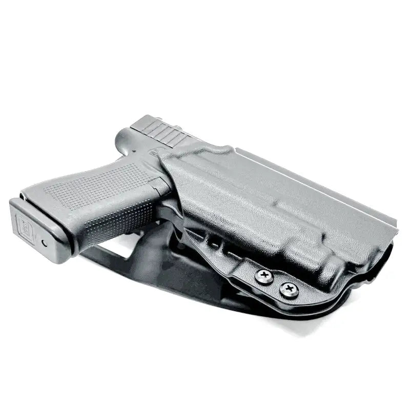 Black Glock 43X pistol with light mounted in a duty holster for first responders