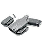 Black Springfield Hellcat Pro pistol in holster with Streamlight TLR-7 and magazine carrier
