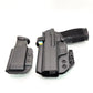 Black Sig P365-XMACRO inside waistband holster with magazine carrier by Four Brothers
