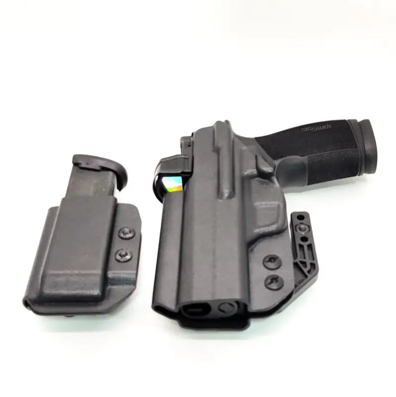 Black Sig P365-XMACRO inside waistband holster with magazine carrier by Four Brothers