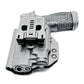 Black Sig Sauer P365-FUSE pistol with light mounted in matching holster with textured grip