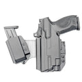 Black pistol and magazine in holster on 4BROS Fat Guy’s Appendix Rig with magazine carrier