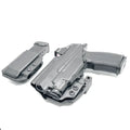 Black pistol and magazine in holsters from Four Brothers Holsters for Sig P365-XMACRO