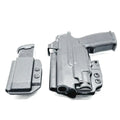 Black Sig P365-XMACRO pistol with magazine holsters from Four Brothers Holsters product display
