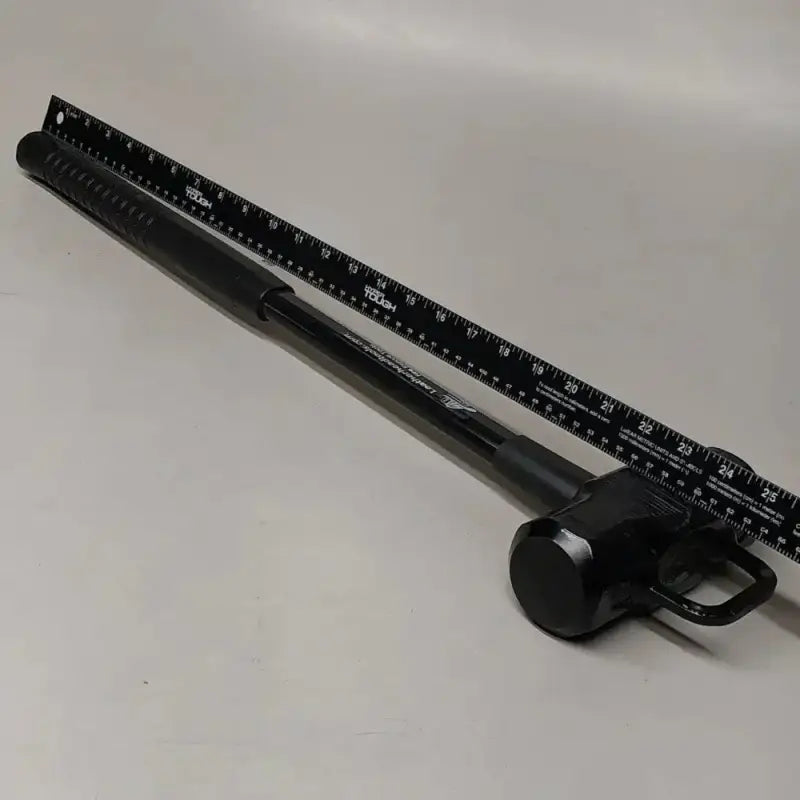 Black plastic ruler with markings in Leatherhead Tools Halligan Entry Tool set