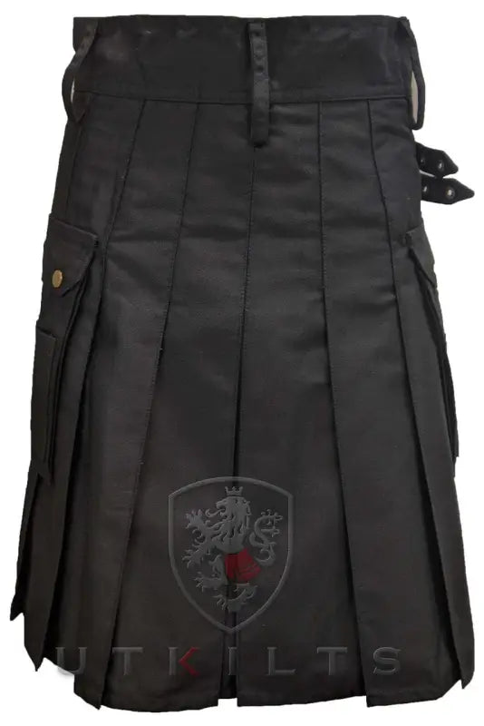 Black pleated utility kilt featuring shield emblem design in Standard Utility Kilt style