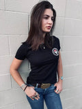Black Woman’s Skully Tee featuring a circular logo patch on the chest