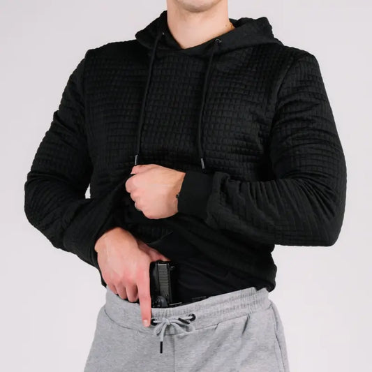 Black quilted Standoff Concealment Hoodie Mk.II paired with gray sweatpants