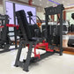 Black and red leg extension machine from SFE Commercial Inner & Outer Thigh Machine for first responders