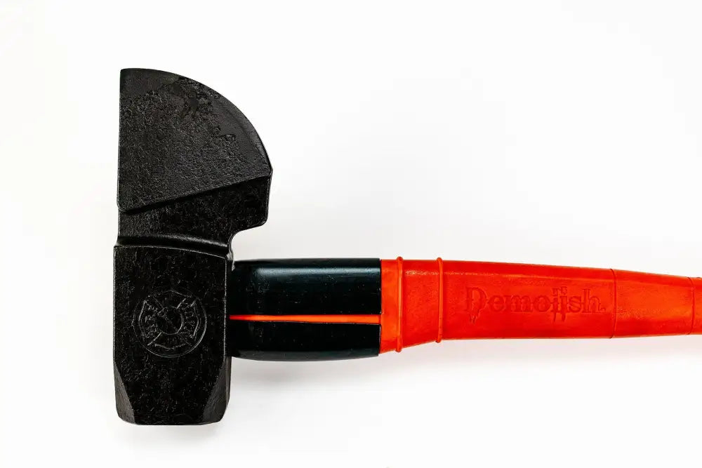 Black rubber mallet with red composite handle, a USA patented striking tool