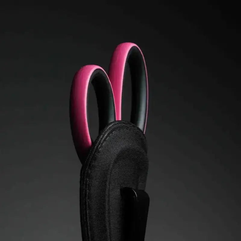 Black scissors with pink bunny ear handles in XShear Soft Holster