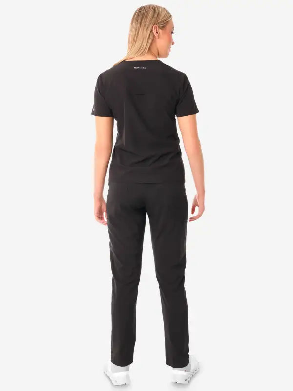 Black short-sleeved jumpsuit with straight-leg pants for women’s stash-pocket scrub style