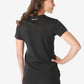 Black short-sleeved Women’s Tuckable One-Pocket Scrub Top viewed from the back