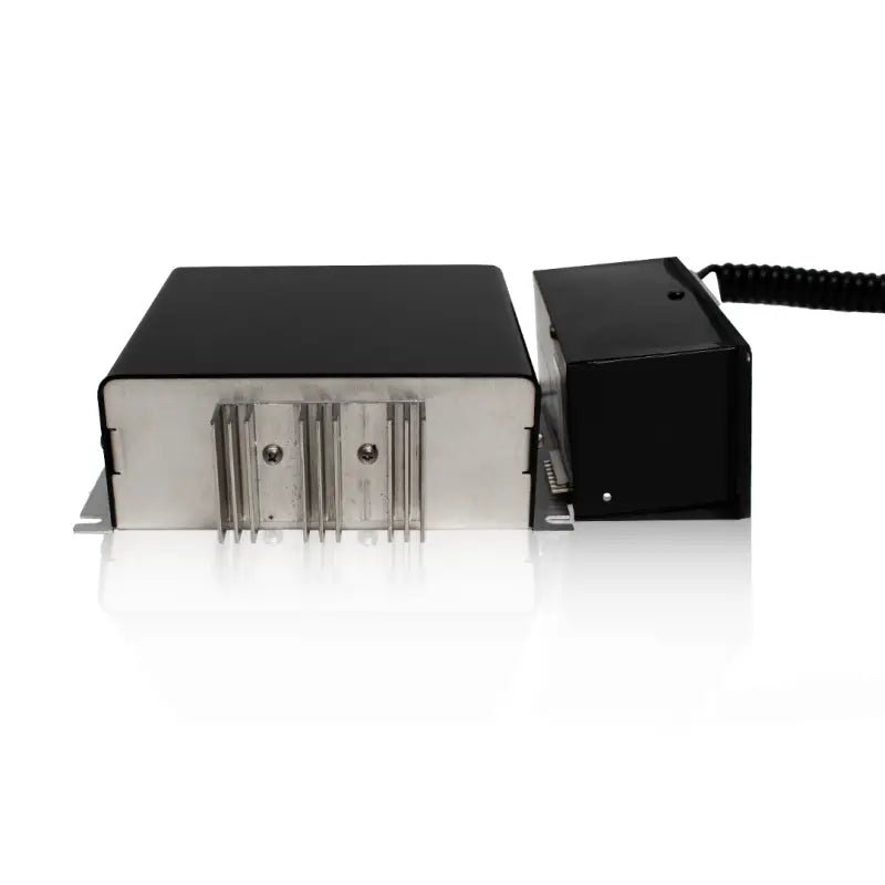 Black and silver Whelen 295HFS2 remote siren amplifier for emergency vehicle alert systems