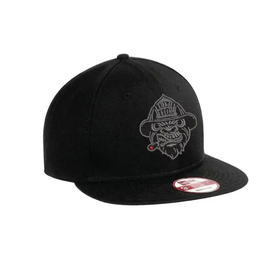 Black snapback cap with gray firefighter bulldog logo for fitted trucker style