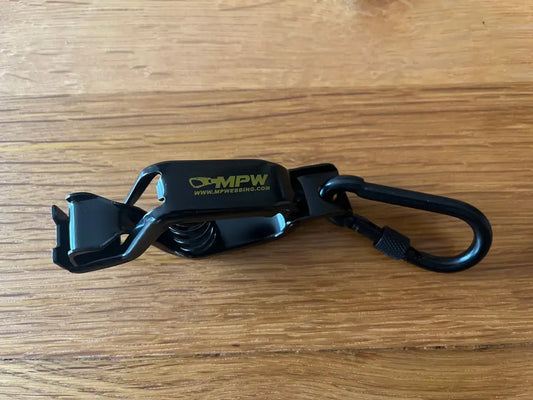 Black spring-loaded metal glove holder with carabiner for first responders and high-grade durability