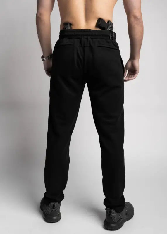 Black sweatpants featuring patented carrier retention waistband and functional zipper fly